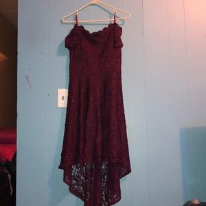 A maroon off the shoulder homecoming dress.